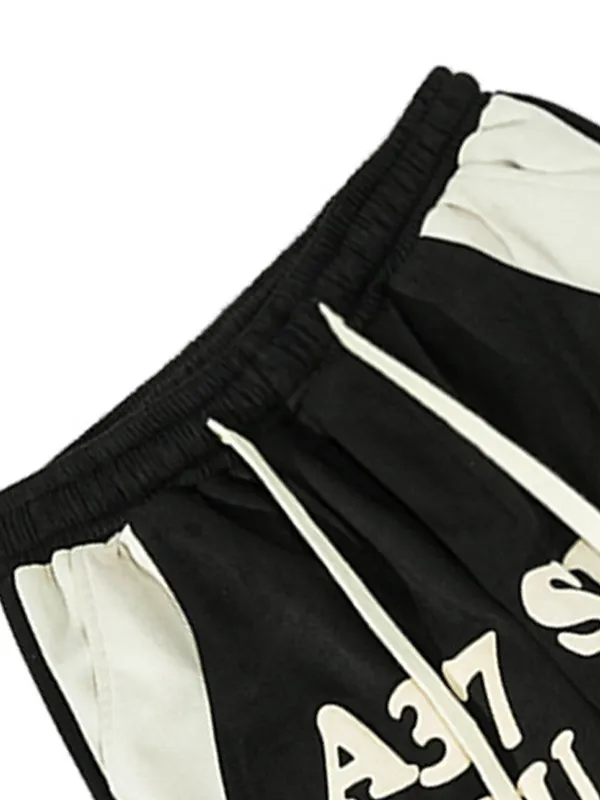 Pantalones cortos casuales sueltos con bloques de color de ante para hombre